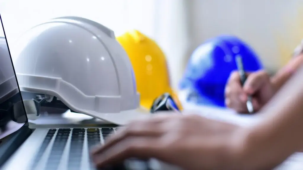 Picture showing safety gear at work (hard hats)